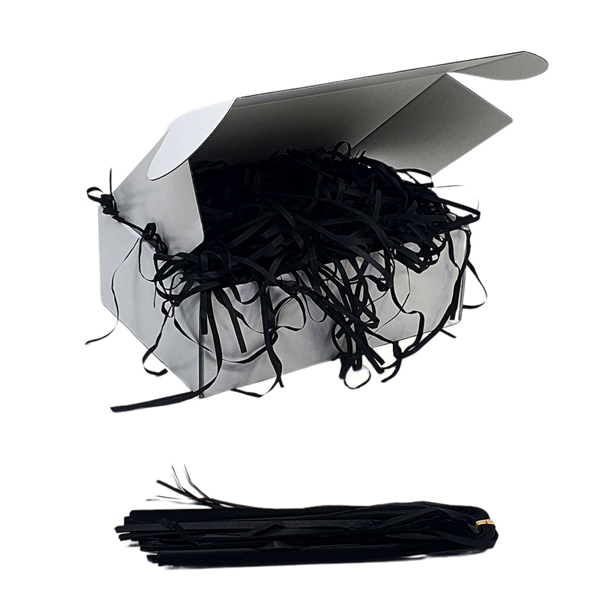 Black tissue shred filler displayed in a white gift box