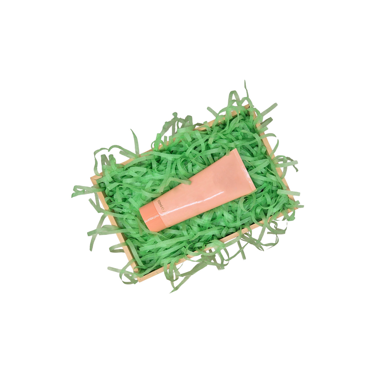 Grass green tissue paper filling presented in a natural gift box