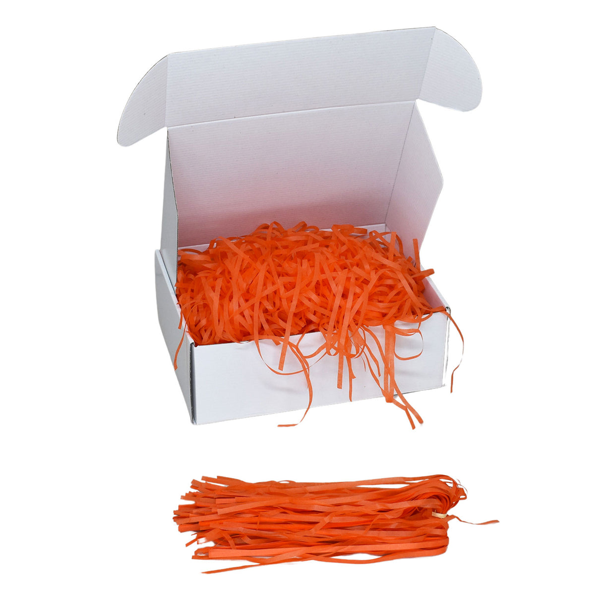 Orange tissue shred filler displayed in a white gift box