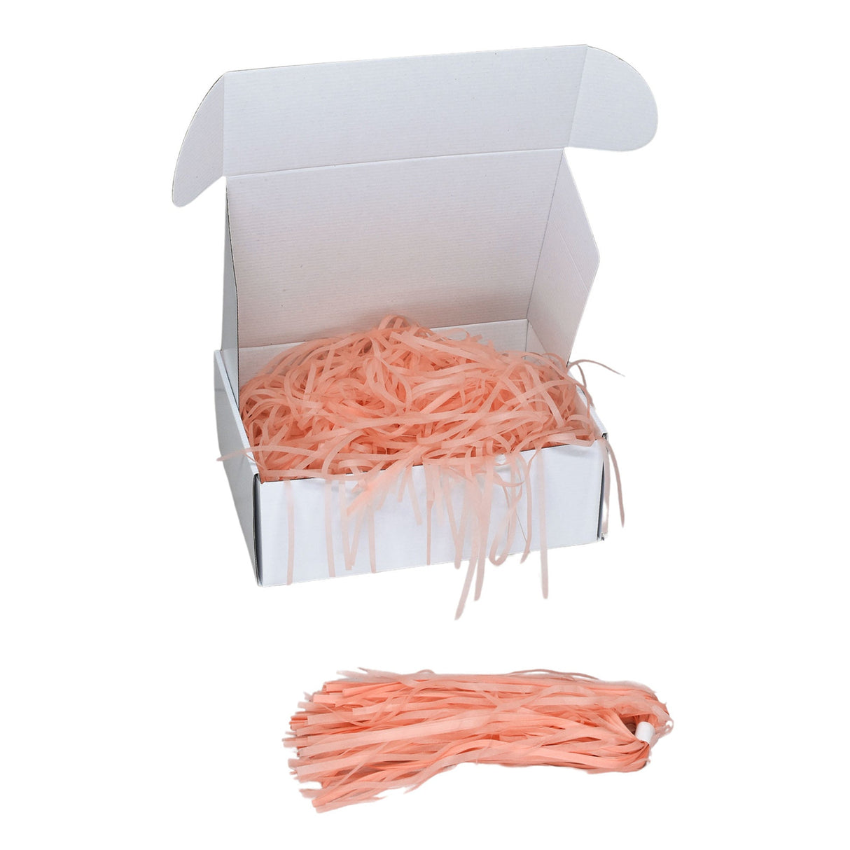 Peach tissue shred filler displayed in a white gift box
