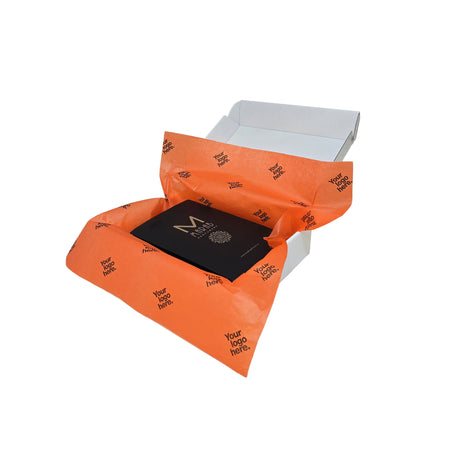 Custom tissue paper orange, arranged in a transport box, 17gsm – size 50x75cm