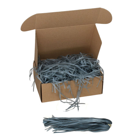 Grey  tissue paper shred filler shown in a brown box