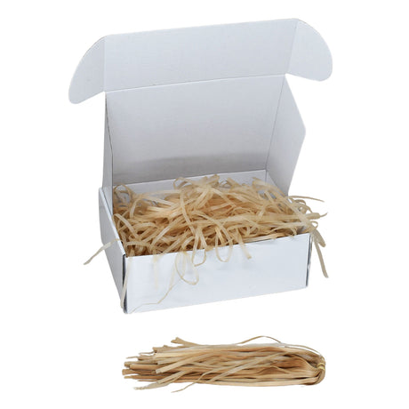 Light Tan  tissue shred filler displayed in a white gift box