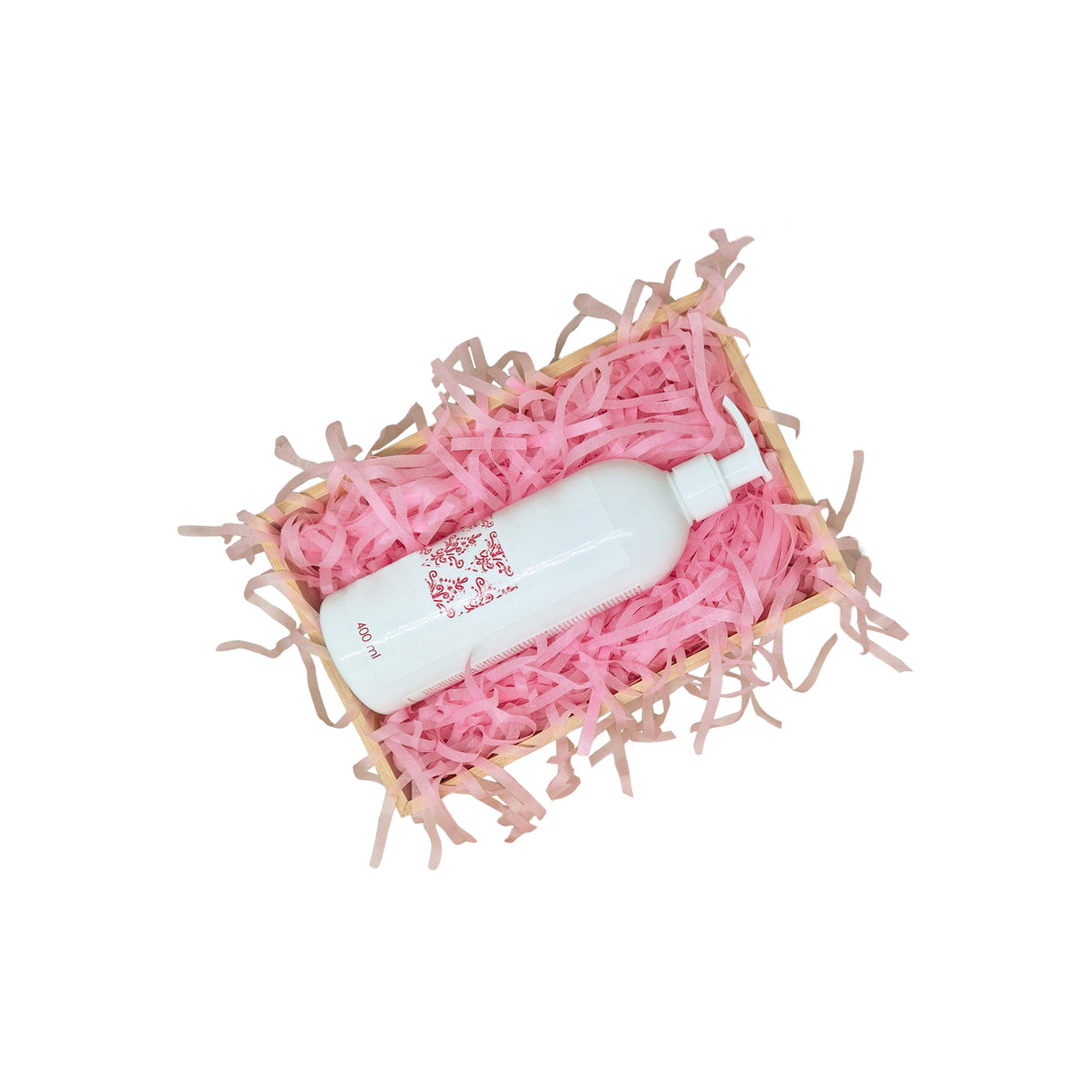 Pale pink tissue paper filling presented in a natural gift box