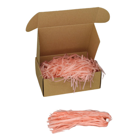 Peach  tissue paper shred filler shown in a brown box