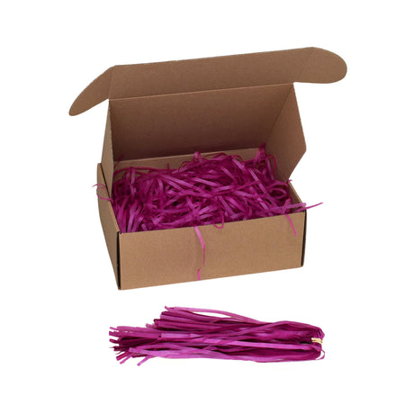 Plum tissue paper shred filler shown in a brown box