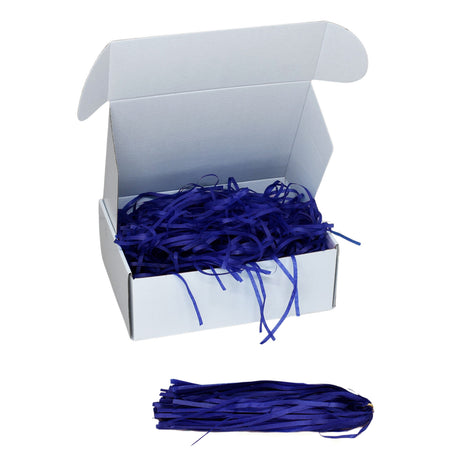 Royal Blue tissue shred filler displayed in a white gift box