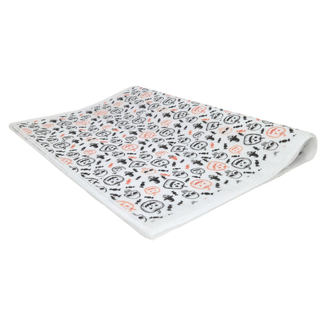 Tissue paper Party Skulls & Pumpkins, ream of folded sheets 17gsm – size 50x75cm