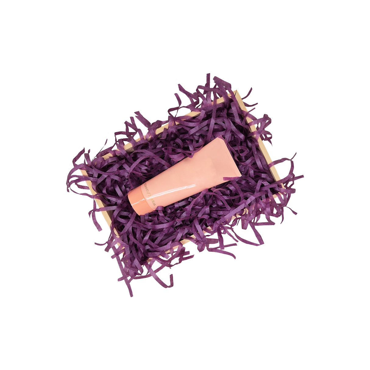 Violet tissue paper filling presented in a natural gift box